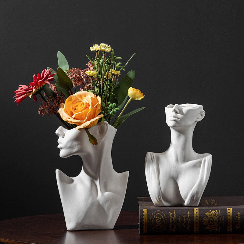 Woman's body ceramic vase