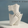 Woman's body ceramic vase